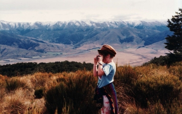 Vanita Andrews taking a photo at age 9